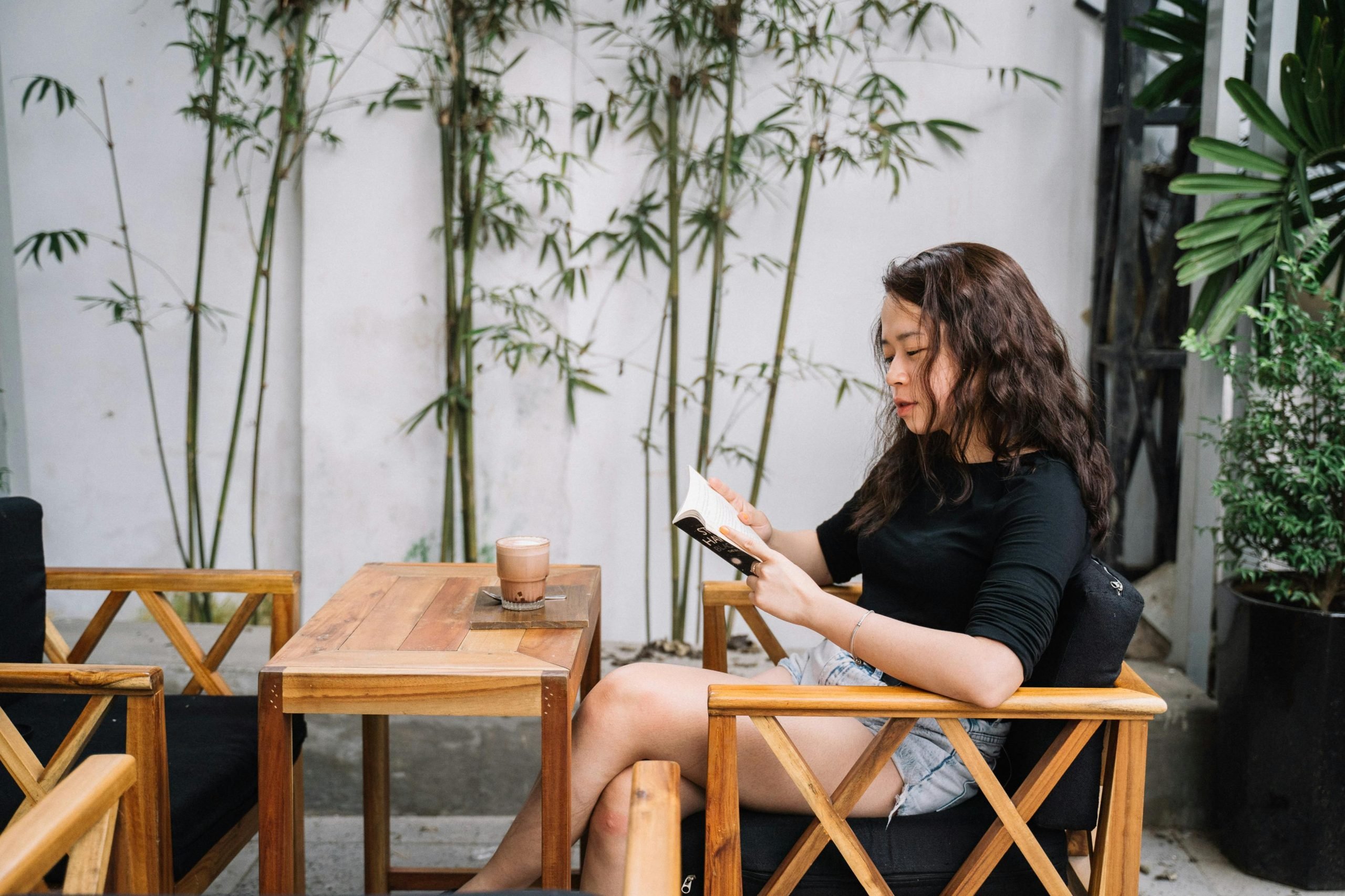 Person placing phone in designated charging spot away from living area