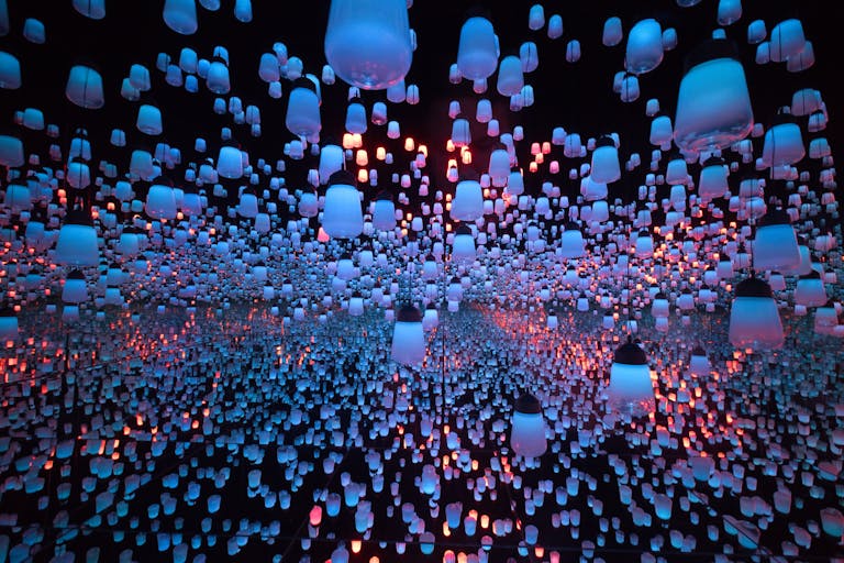 A mesmerizing display of colorful hanging lanterns in a Tokyo art museum.