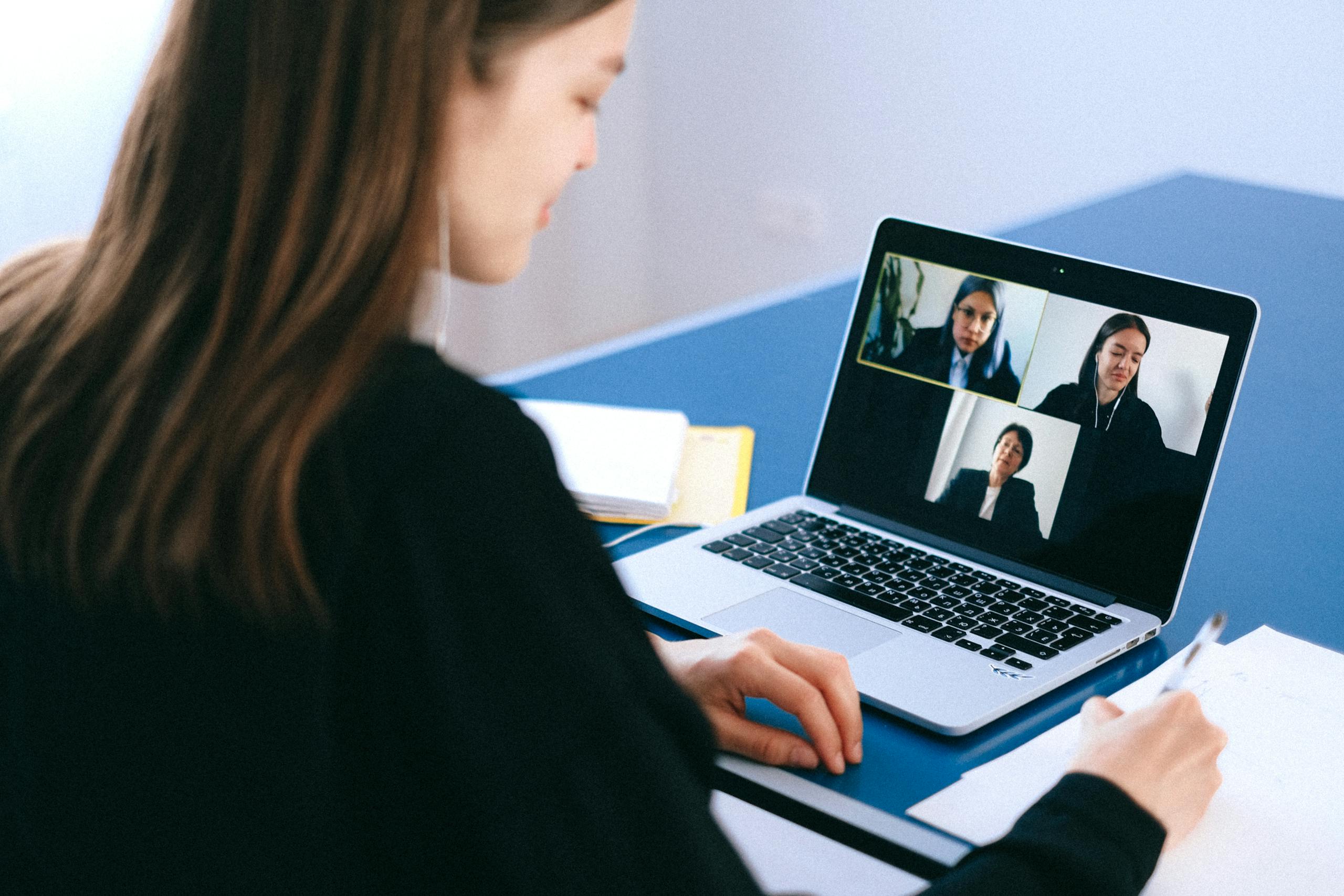 Stressed introvert on video conference call being called on to speak unexpectedly