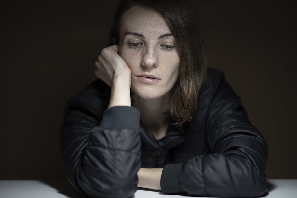 Contemplative woman representing the complex relationship between introversion and depression, showing thoughtful introspection and mental health awareness