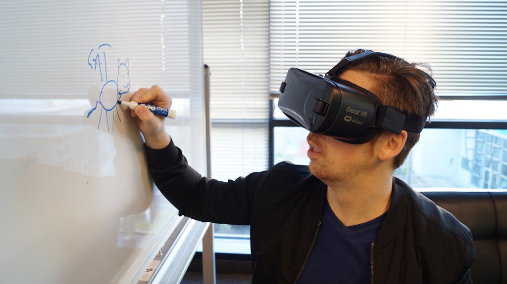 Professional using VR technology for creative work showing emerging career opportunities in extended reality and immersive technology development