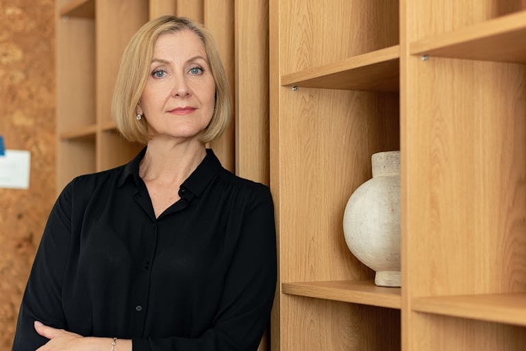 Confident professional taking bold career step forward with determination