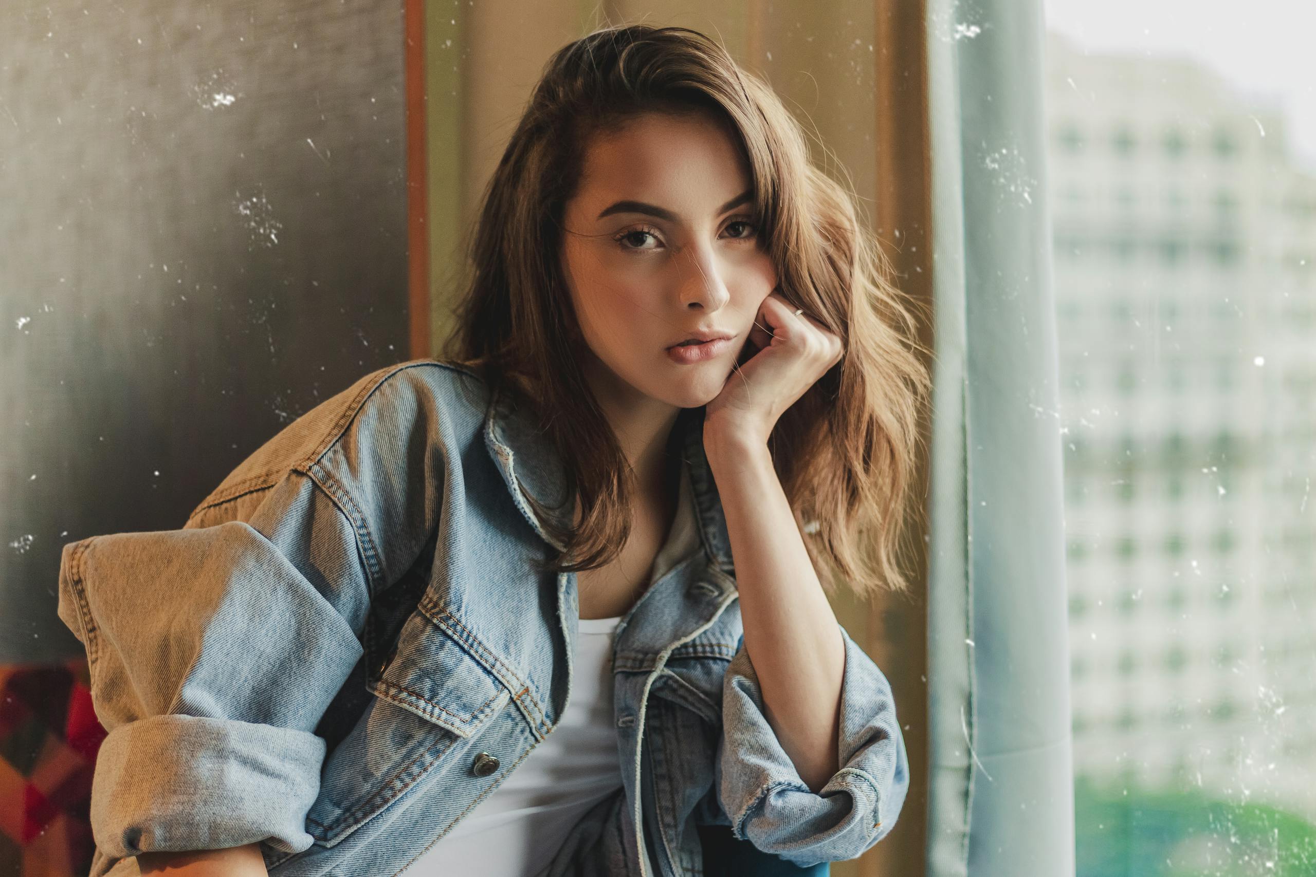 Business professional reviewing analytical data charts on computer screen demonstrating objective decision-making process