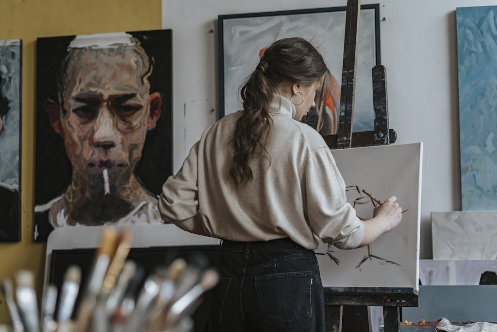 Two ISFP partners sharing a quiet creative moment together in their art studio