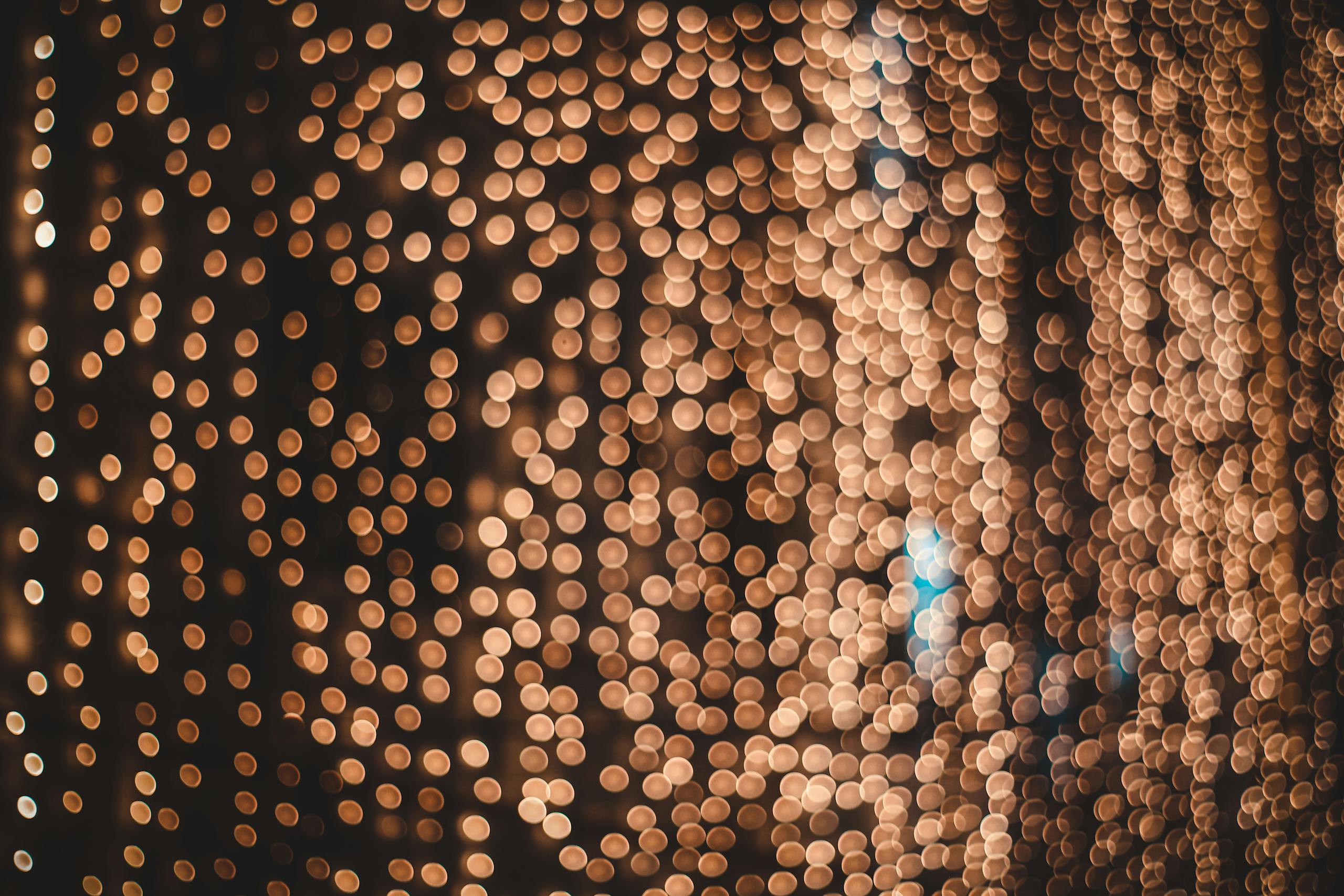 A stunning abstract display of warm glowing bokeh lights, perfect for festive backdrops.