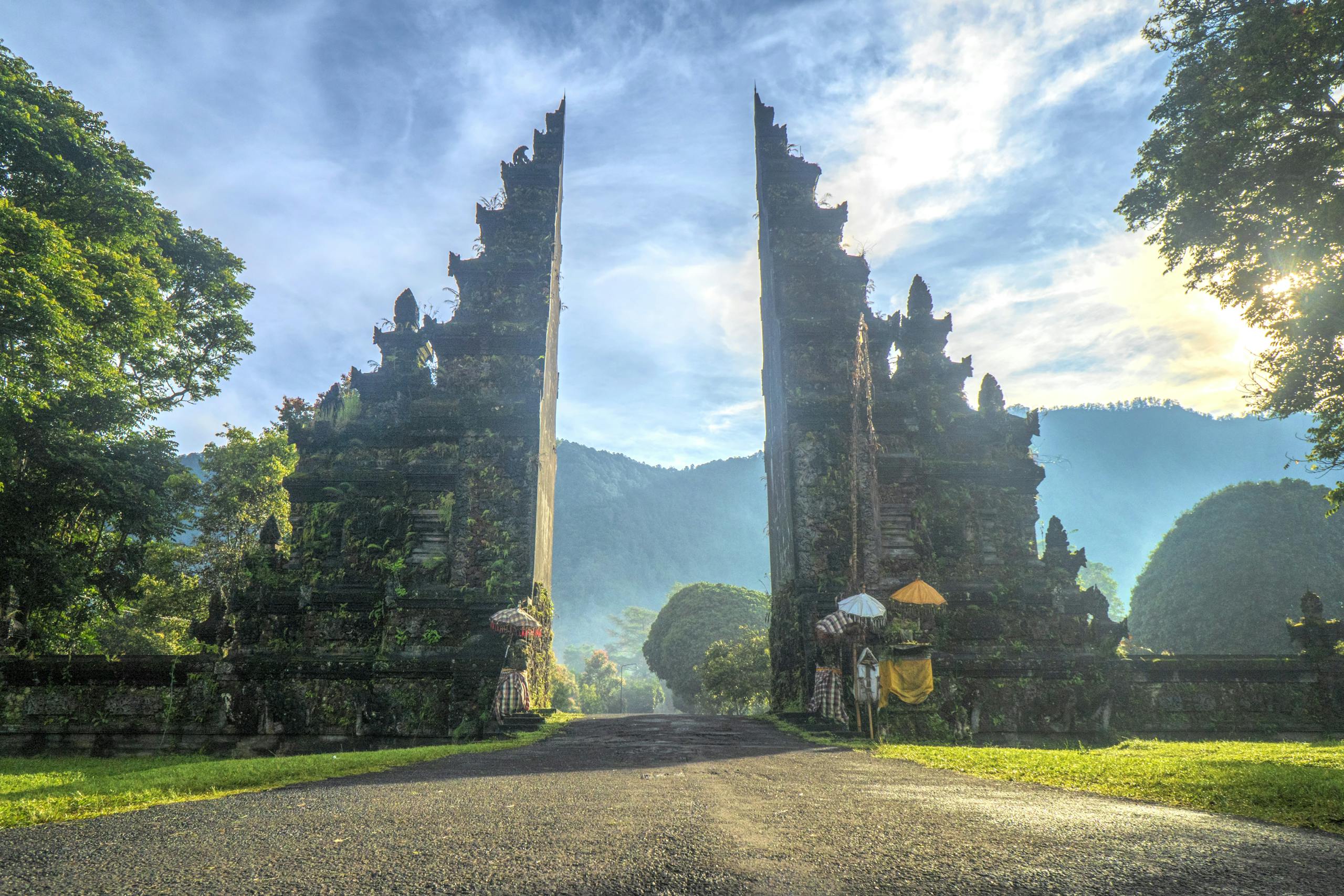 Stunning view of the Handara Gate in Bali with mountains and lush greenery.