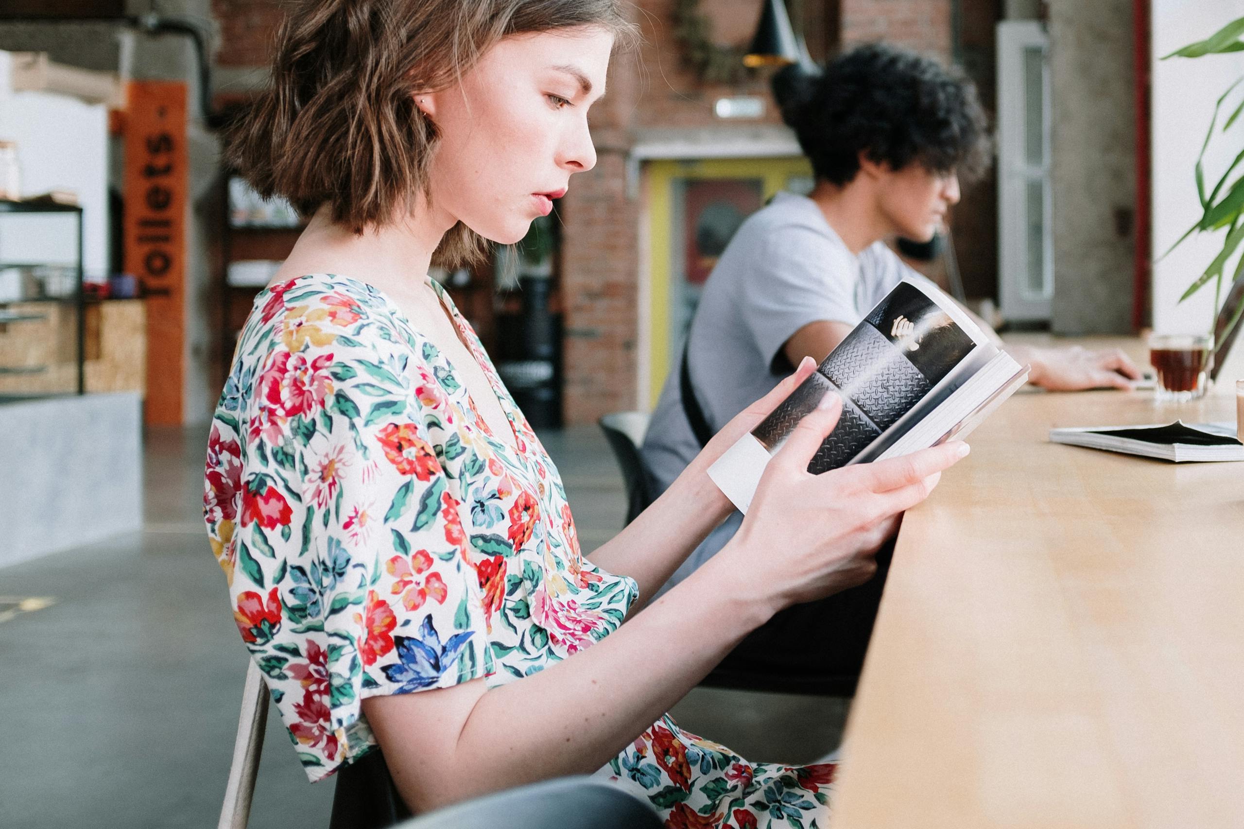 Couple sitting together peacefully reading and relaxing in comfortable silence