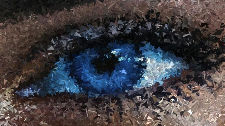 Abstract geometric mosaic design of eye with rich blue and brown tones.