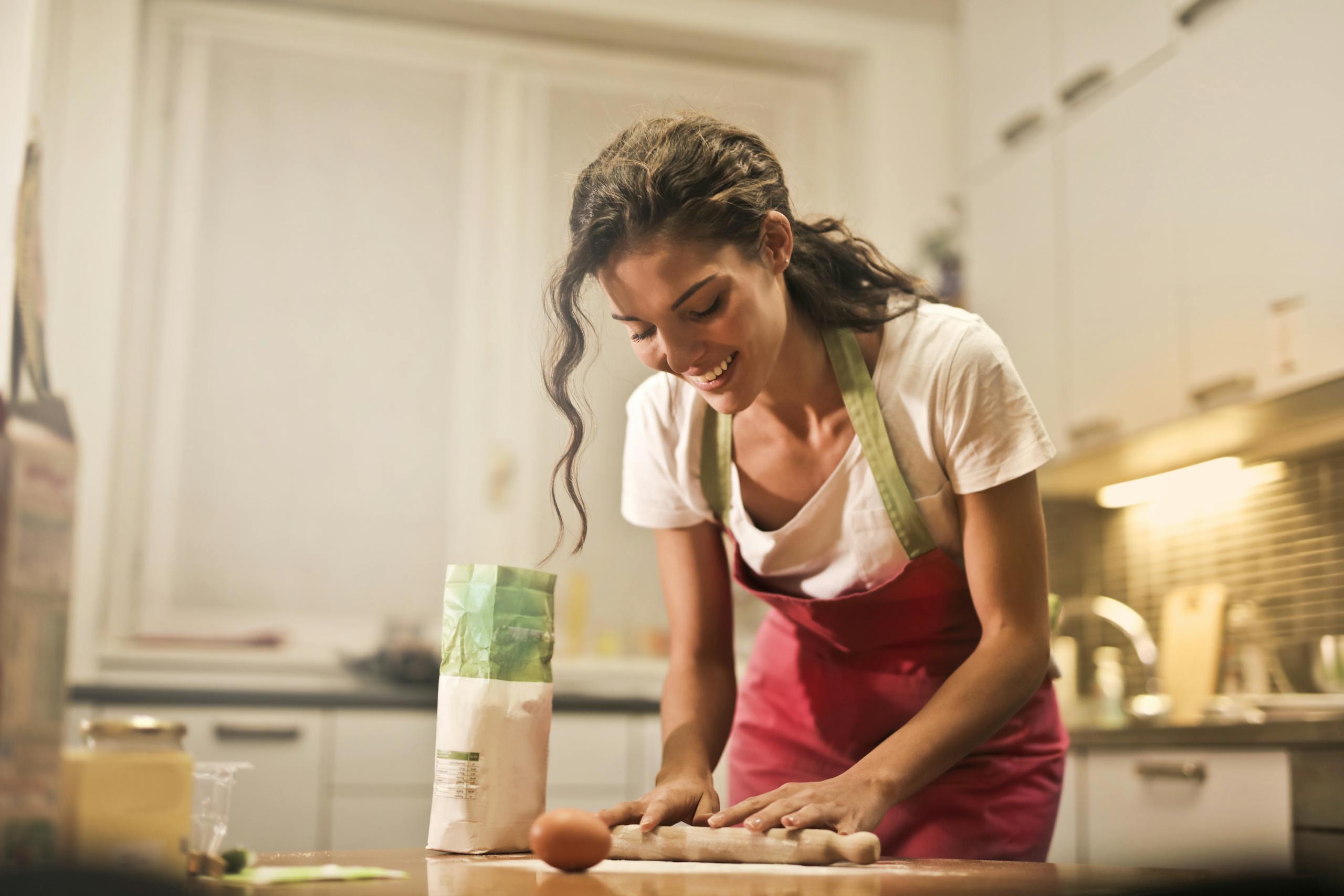 Introvert preparing thoughtful homemade meal for partner in quiet kitchen