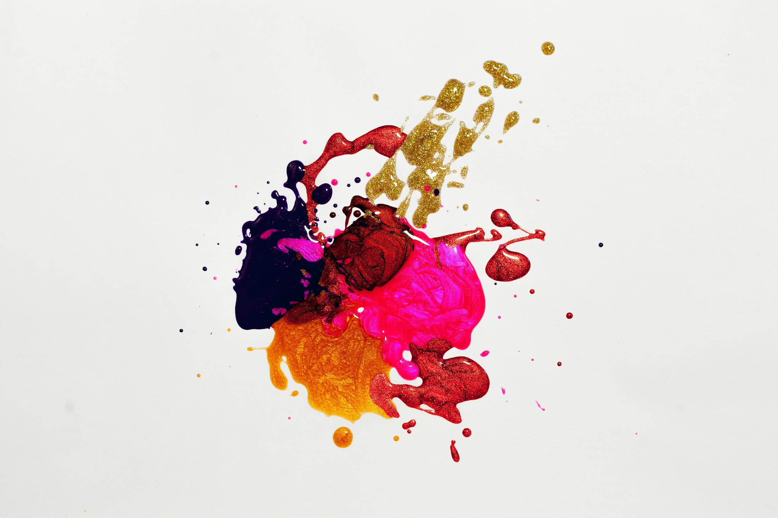 Colorful abstract paint splash on white background depicting creative expression