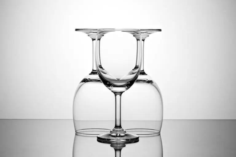 Elegant display of inverted and upright wine glasses showcasing symmetry.