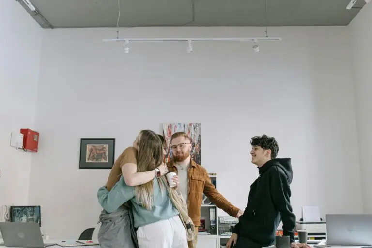 ESTP professional celebrating immediate career win in dynamic office environment.