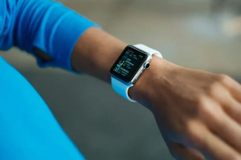 Close-up of smartwatch on adult wrist showing digital display