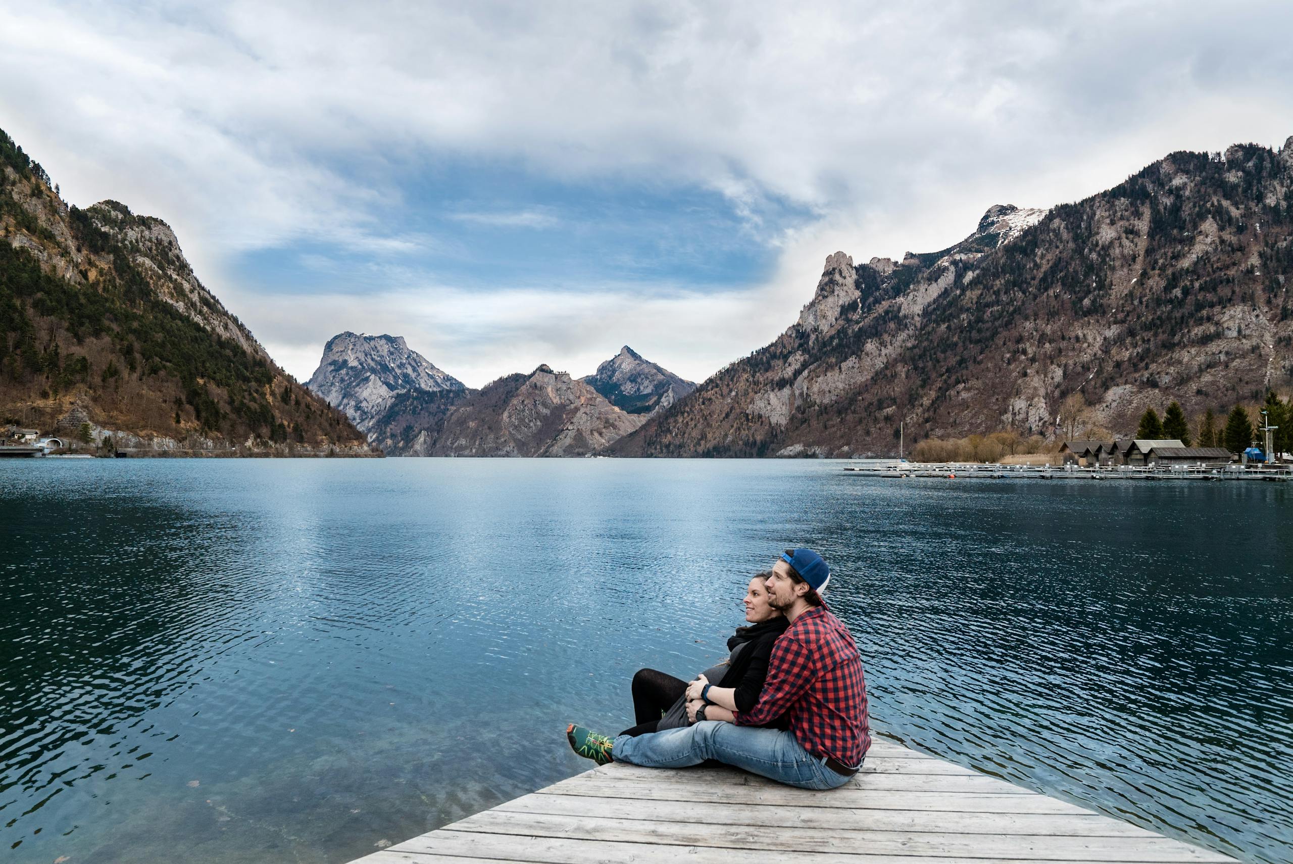 Couple enjoying scenic lake and mountain view together in Ebensee Austria