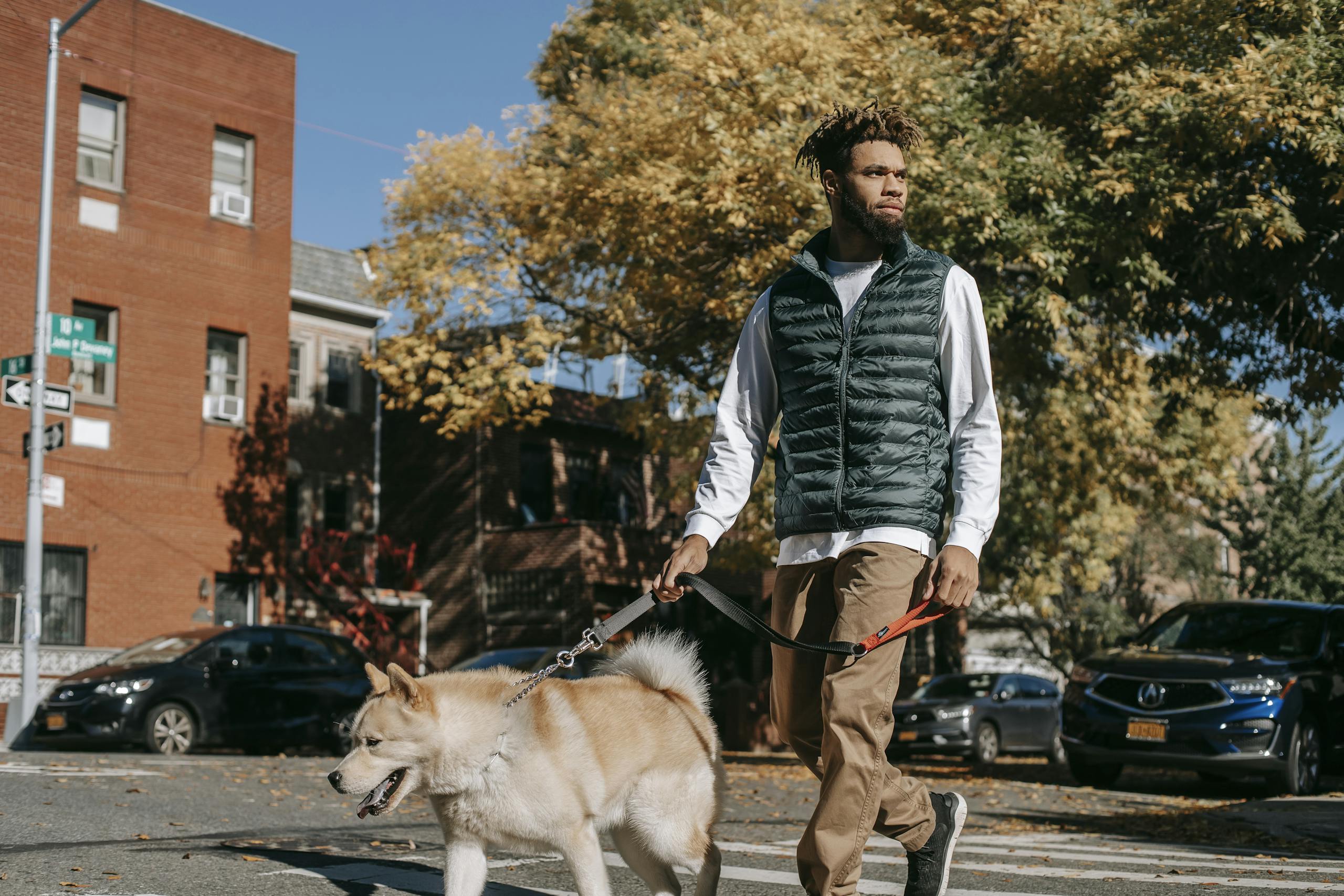 Person walking through new neighborhood exploring surroundings at comfortable distance from crowds
