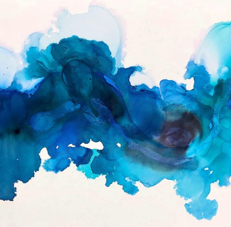 Vibrant abstract fluid art in blue tones creating dynamic patterns.